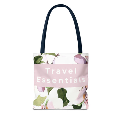 Floral tote bag with 'Travel Essentials' text on a white background