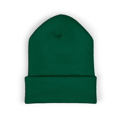 Green beanie on a white background