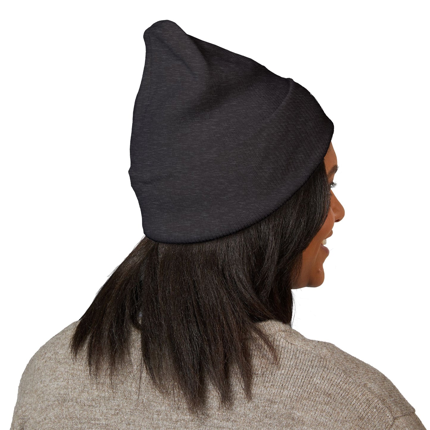 Person wearing a black beanie on a white background