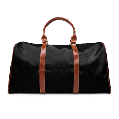Black waterproof weekender duffle bag with brown leather handles front view