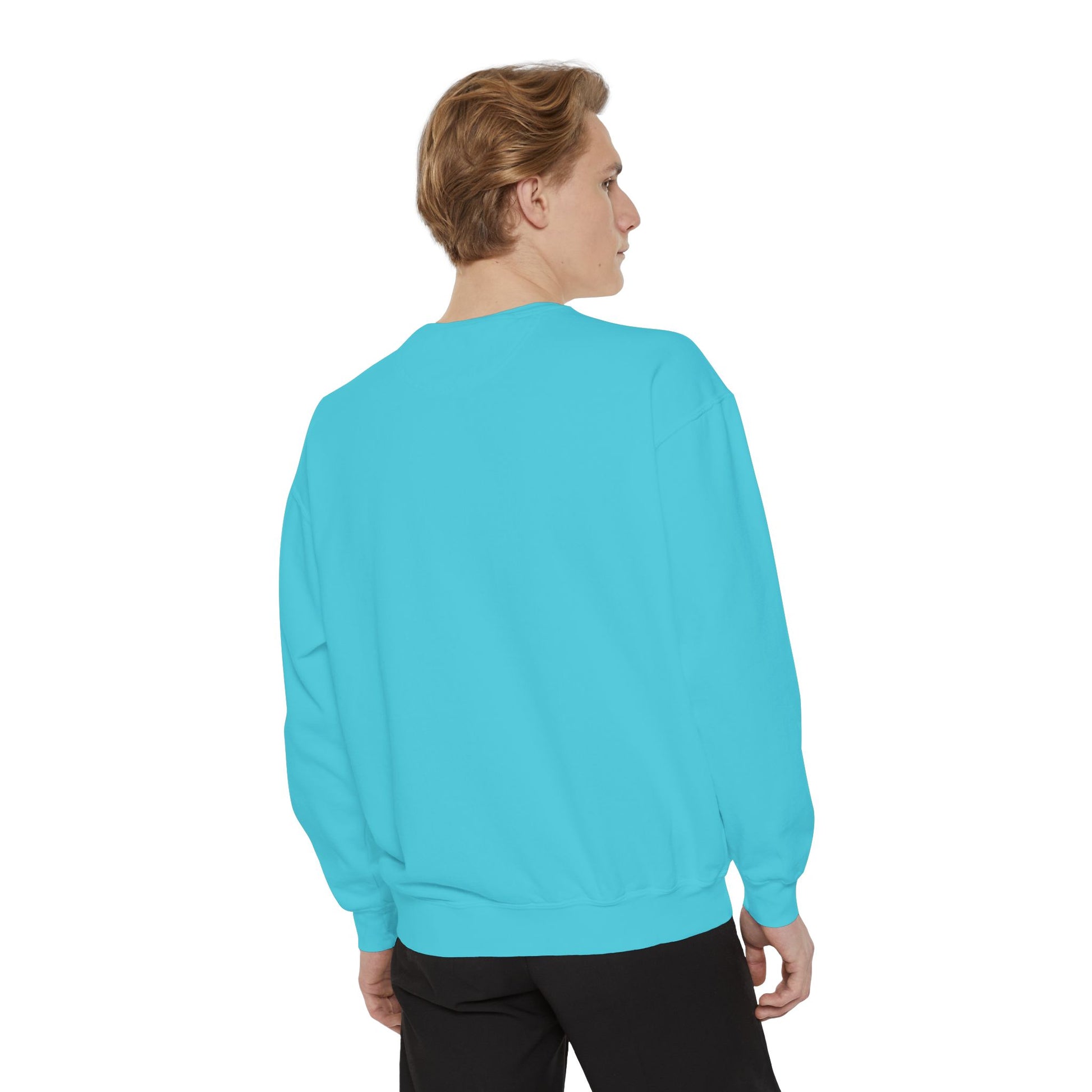 Person wearing a bright blue sweatshirt on a white background