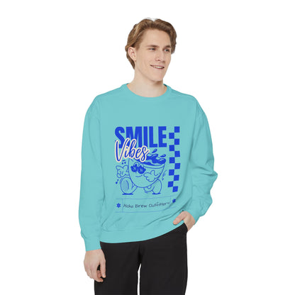 Person wearing a turquoise sweatshirt with a graphic design and text 