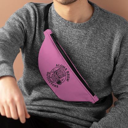 Person wearing a pink sling bag with 'Aloha Brew Outfitters' logo.
