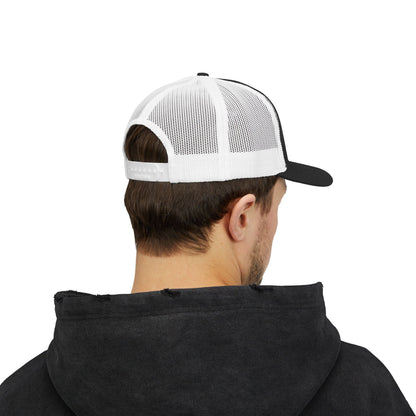 Person wearing a black hoodie and a white and black cap 