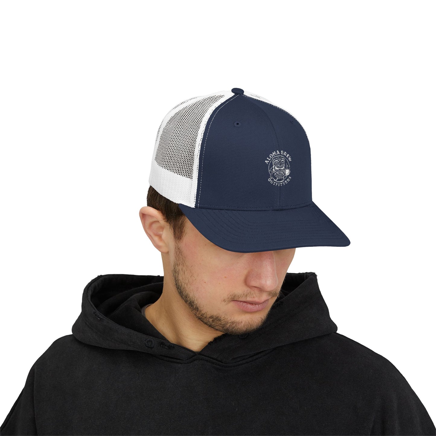 Man wearing a navy and white cap with a logo on a white background