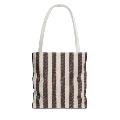 Minimal striped tote bag carried over shoulder for daily errands