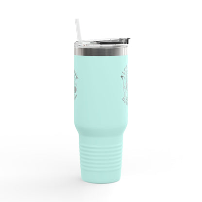 Mint green tumbler with a straw on a white background